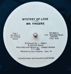 "Mystery of Love" vinyl label