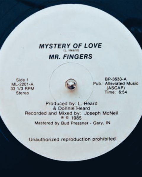 "Mystery of Love" vinyl label
