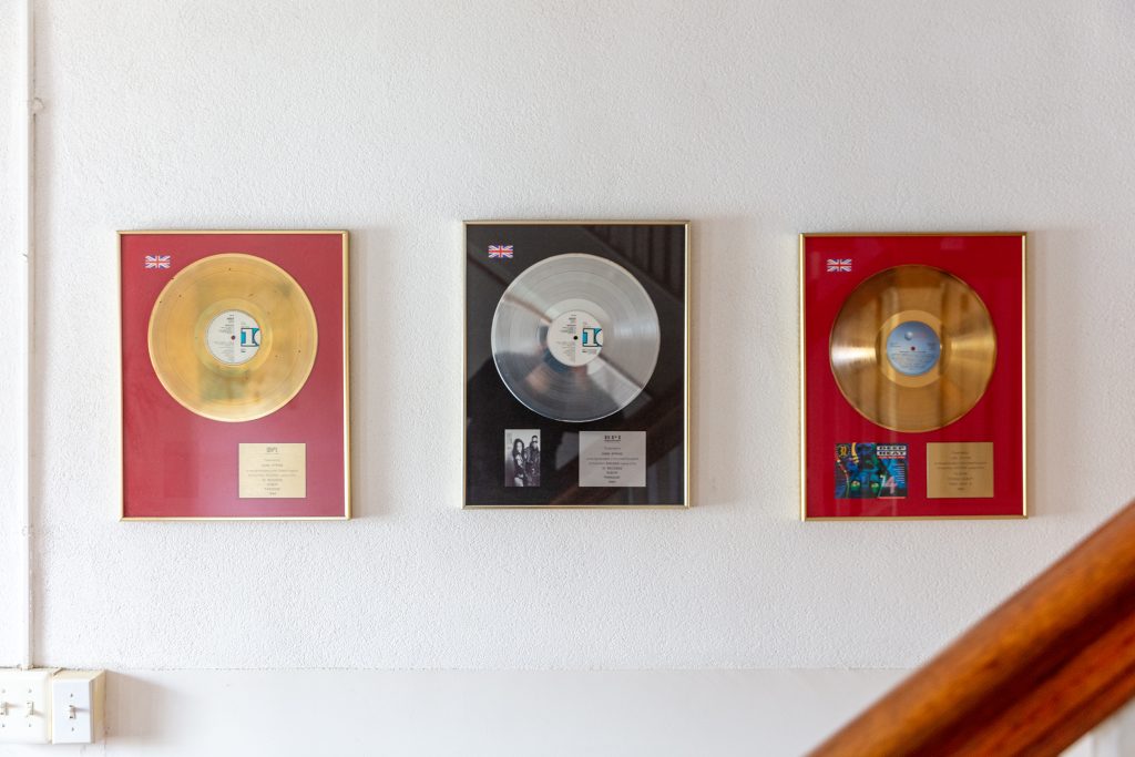 Gold records on the wall of Submerge