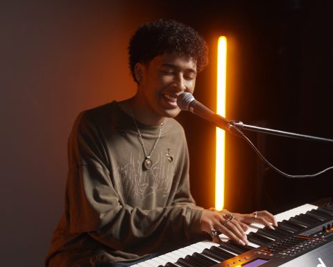 Adrian Lyles performs on a Roland RD-2000 stage piano.