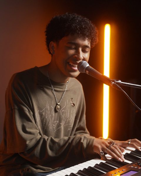 Adrian Lyles performs on a Roland RD-2000 stage piano.