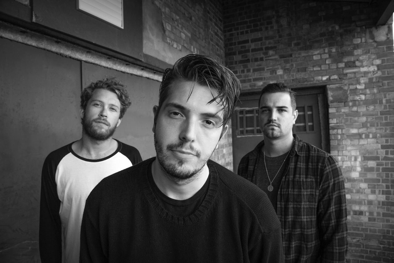 Drum tech Tom 'Woody' Wood (right) in press shot with his band Beasts