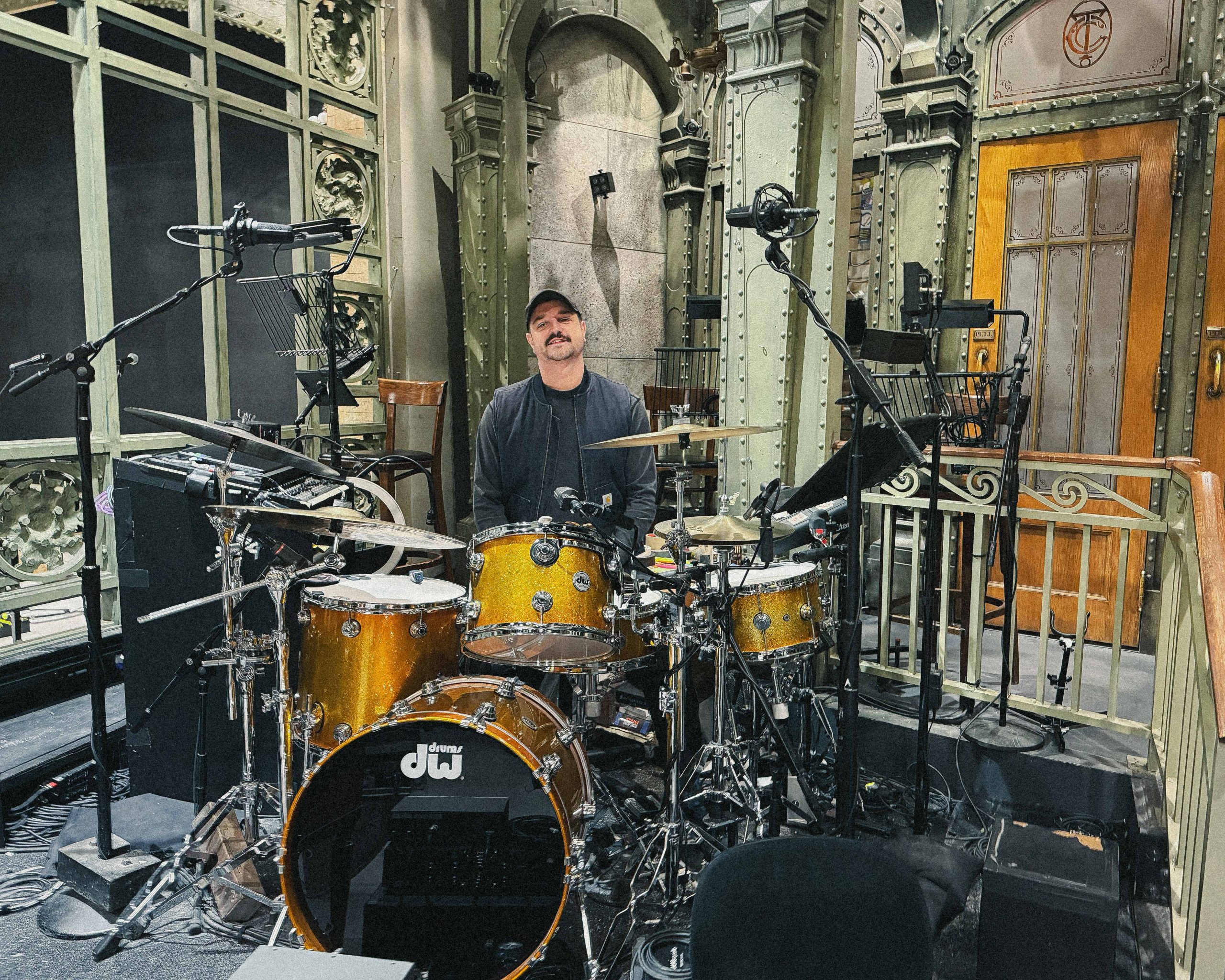 Drum tech Tom 'Woody' Wood and DW Drums kit on the set of Saturday Night Live in March 2026 with Gorillaz