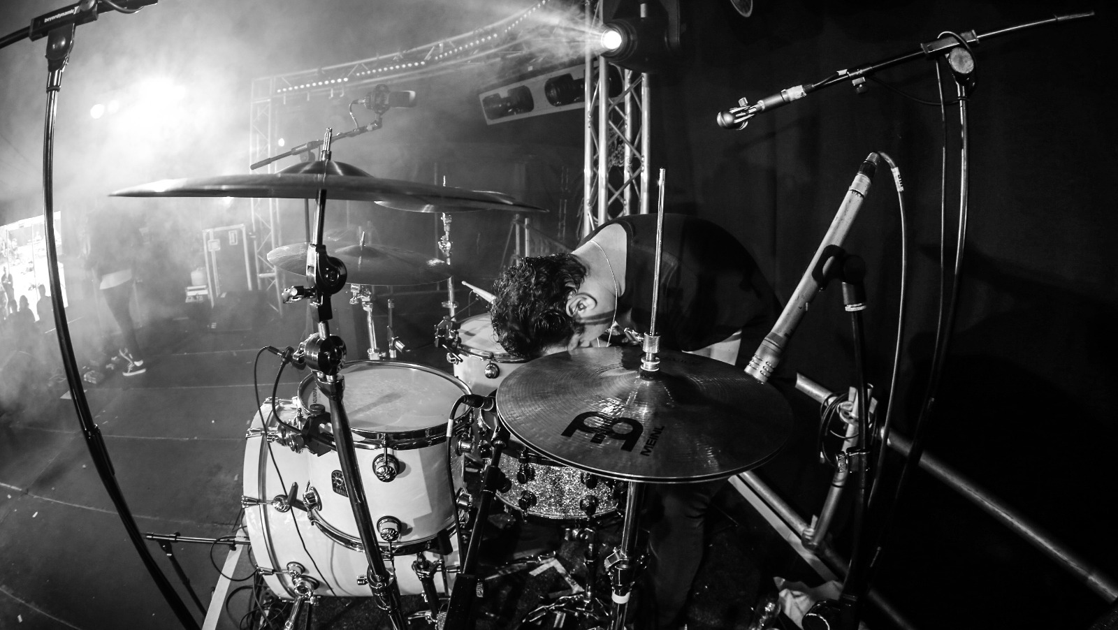 Drum tech and drummer Tom 'Woody' Wood performing with Beasts