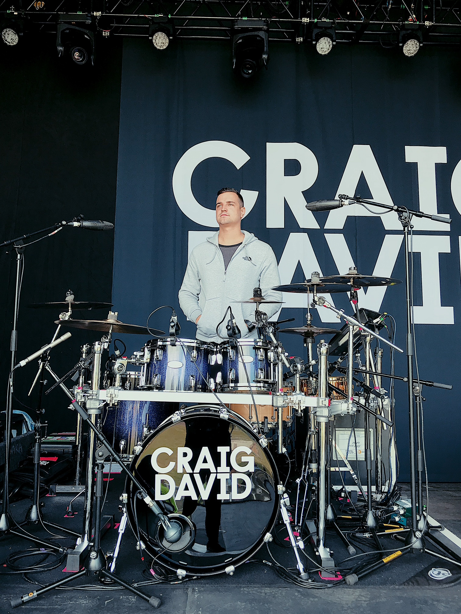 Drum tech Tom "Woody" Wood teching with Craig David.